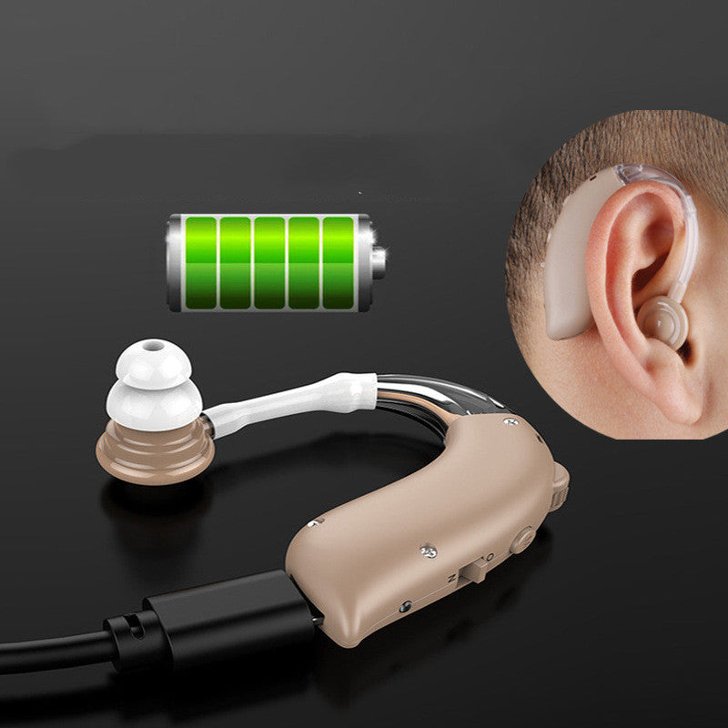 Intelligenter Rauschunterdrücker mit Ladekabel und Zubehör, speziell für Soundverstärker, in neutraler Umgebung.