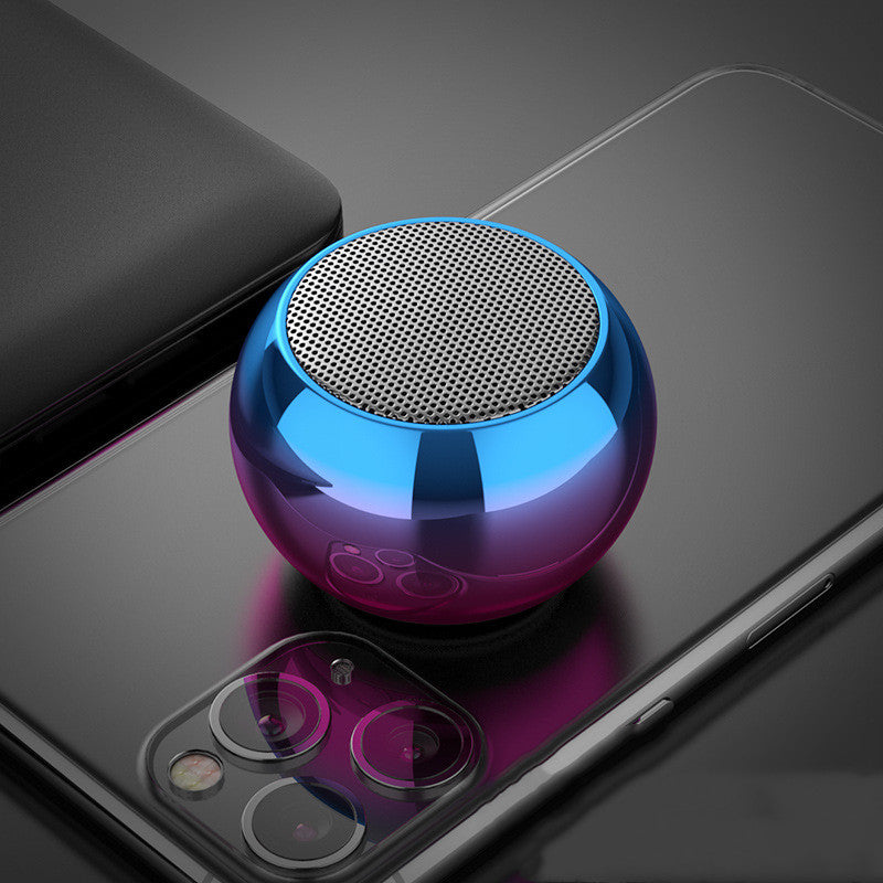 Bunter kabelloser Lautsprecher im runden Stahlgehäuse mit 3D-Elektroplattierung, Bluetooth, Radio und USB-Unterstützung.